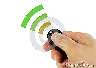 Man holding remote sensor in hand sending signal Stock Photo