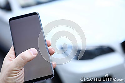 Man holding sensory cellphone Stock Photo