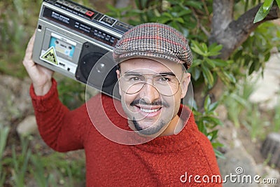 Man holding stereo boombox in the 1980s Stock Photo