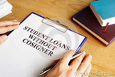 Man holding student loans without cosigner application form Stock Photo