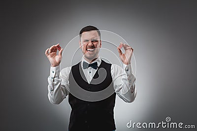 A man holding up red poker chips. Poker Stock Photo