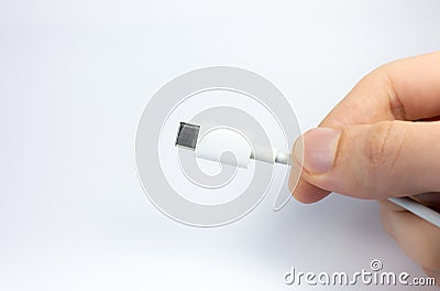 Man holding USB Type C Port Cable for charging. Close up photo Stock Photo