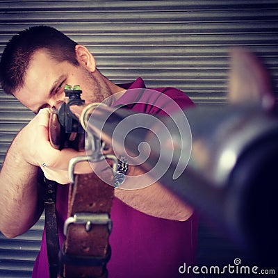 Man holding a vintage shotgun Stock Photo