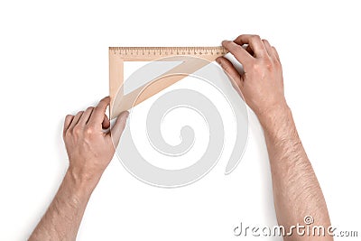 Man holding a wooden set square Stock Photo