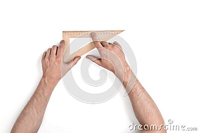 Man holding a wooden set square Stock Photo