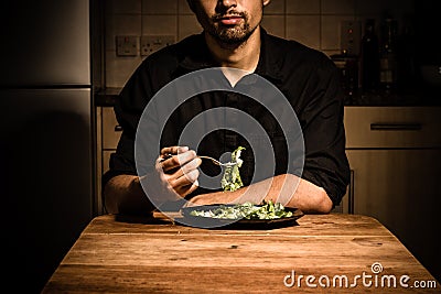 https://thumbs.dreamstime.com/x/man-home-having-dinner-young-his-kitchen-late-night-33185947.jpg
