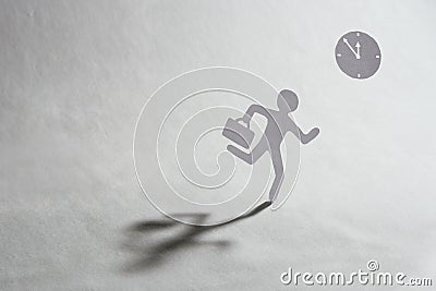 Man in a hurry with watch on a background Stock Photo