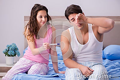 The man husband upset about pregnancy test results Stock Photo