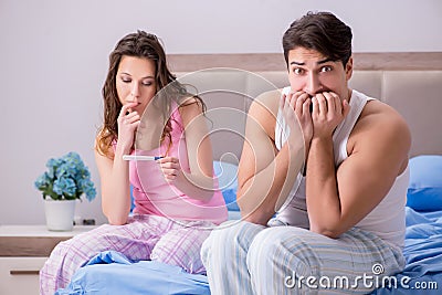 The man husband upset about pregnancy test results Stock Photo