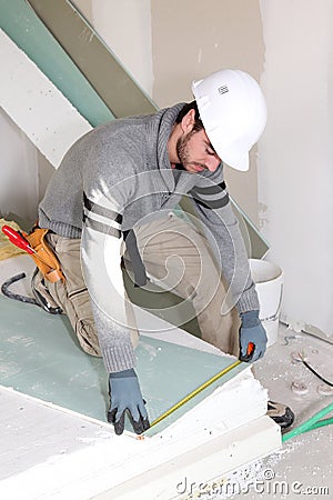 Man installing wall panels Stock Photo