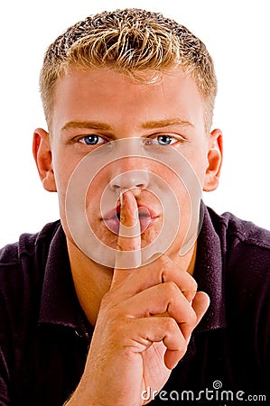 Man instructing you to keep silent Stock Photo