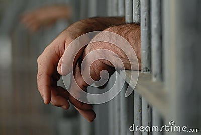 Man in jail or prison Stock Photo