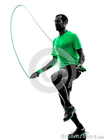 Man jumping rope exercises fitness silhouette Stock Photo