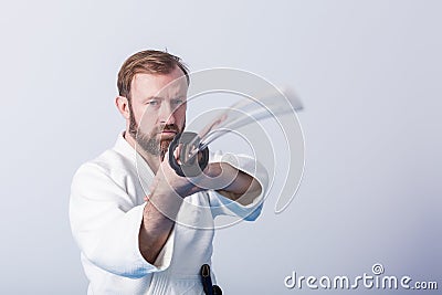 A man with katana on Iaido practice Stock Photo