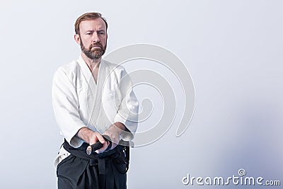 A man with katana on Iaido practice Stock Photo