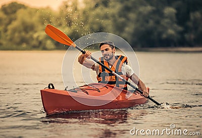 Man and kayak Stock Photo