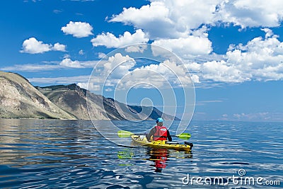 The man in a kayak on Lake Baikal Editorial Stock Photo