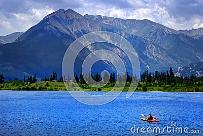 Man on Kayak on Lake Mountains Wilderness Paddling Editorial Stock Photo