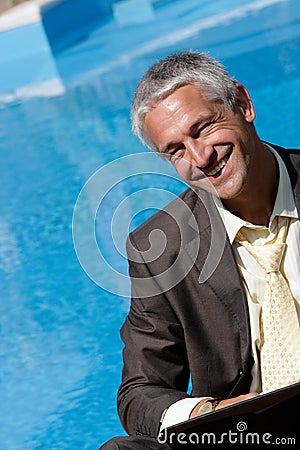 Man with laptop computer Stock Photo