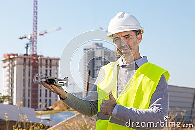 Man launches a quadcopter Stock Photo