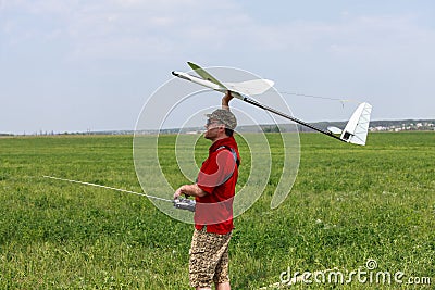 Man launches into the sky RC glider Stock Photo