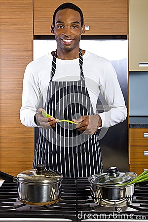 Man Learning How To Cook Stock Photo