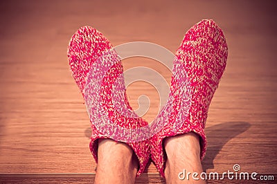 Man Legs in red Wool Socks male knitted clothes winter Stock Photo