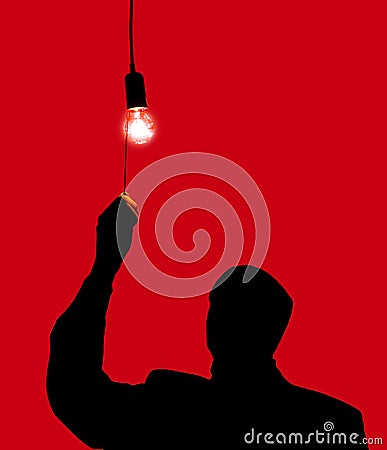 Man and a light bulb Stock Photo