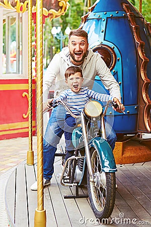 Man with little boy having fun Stock Photo