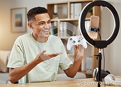 Man, live streaming for gaming and social media influencer, .smartphone filming tech review, online gamer with Stock Photo
