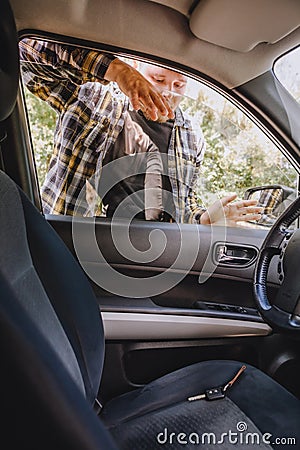 man locked car and forget keys inside Stock Photo