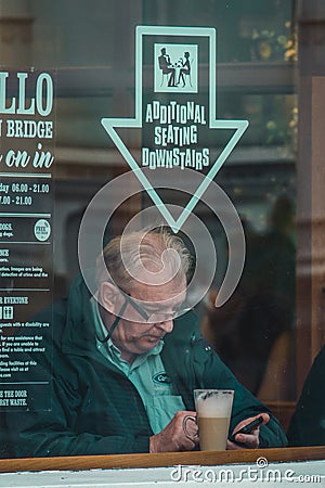 Man in London cafe Editorial Stock Photo