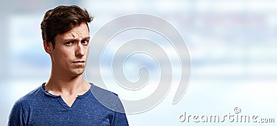 Man looking camera with doubt. Stock Photo