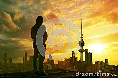 Man looking at kuwait city skyline Stock Photo