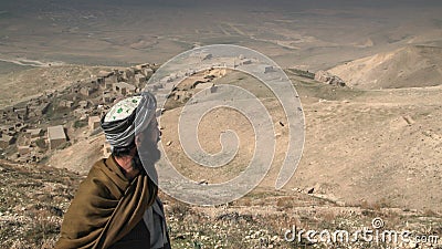 Man looking for new fields in northern Afghanistan Editorial Stock Photo