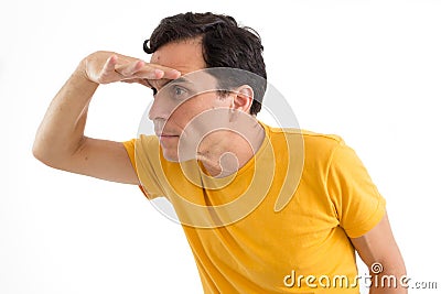 Man is looking for something. Trying to see. He`s on his feet. I Stock Photo