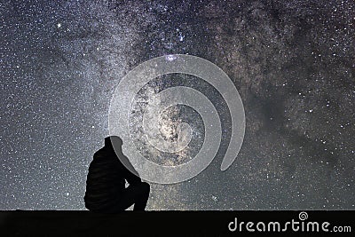 Man looking at the stars Stock Photo