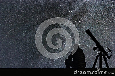 Man looking at the stars, astronomy telescope. Milky Way starry Stock Photo