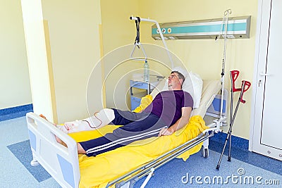 Man lying in hospital after surgery Stock Photo