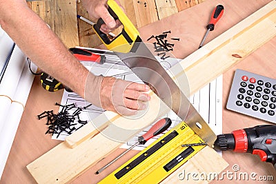 A man made a piece of furniture Stock Photo