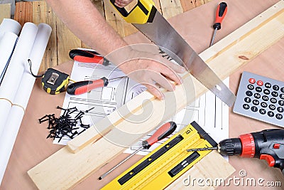 A man made a piece of furniture Stock Photo