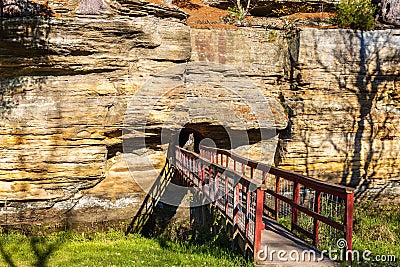 Man-made tunnel in the natural rock bridge at Pier County Park Stock Photo