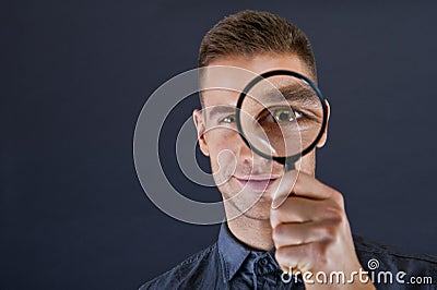 Man with magnifier Stock Photo