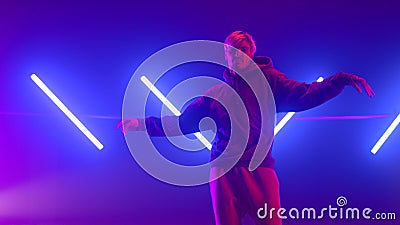 Man make body wave dancing hiphop in club close up. Guy performing freestyle. Stock Photo