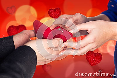 Man make a proposal on bokeh valentine background Stock Photo