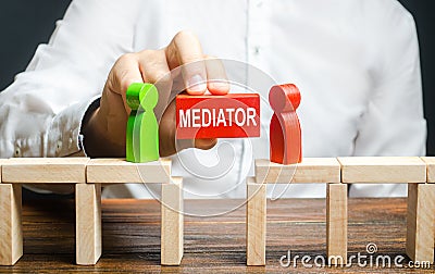 A man makes contact between people opponents. Arbitrator and mediator. Build bridges, seek a compromise in disputes Stock Photo