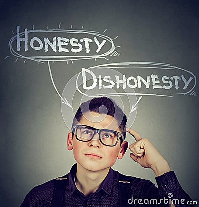 Man making a decision honesty vs dishonesty Stock Photo