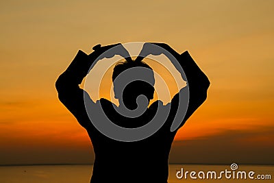 Man making heart shape. Stock Photo