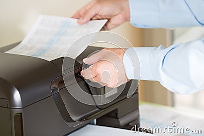 Man making a photocopy Stock Photo