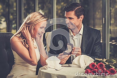 Man making propose to his girlfriend Stock Photo